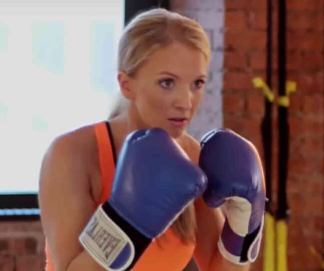 Holly Roser, creator of the H-Method, demonstrating a boxing interval in her San Mateo Studio.